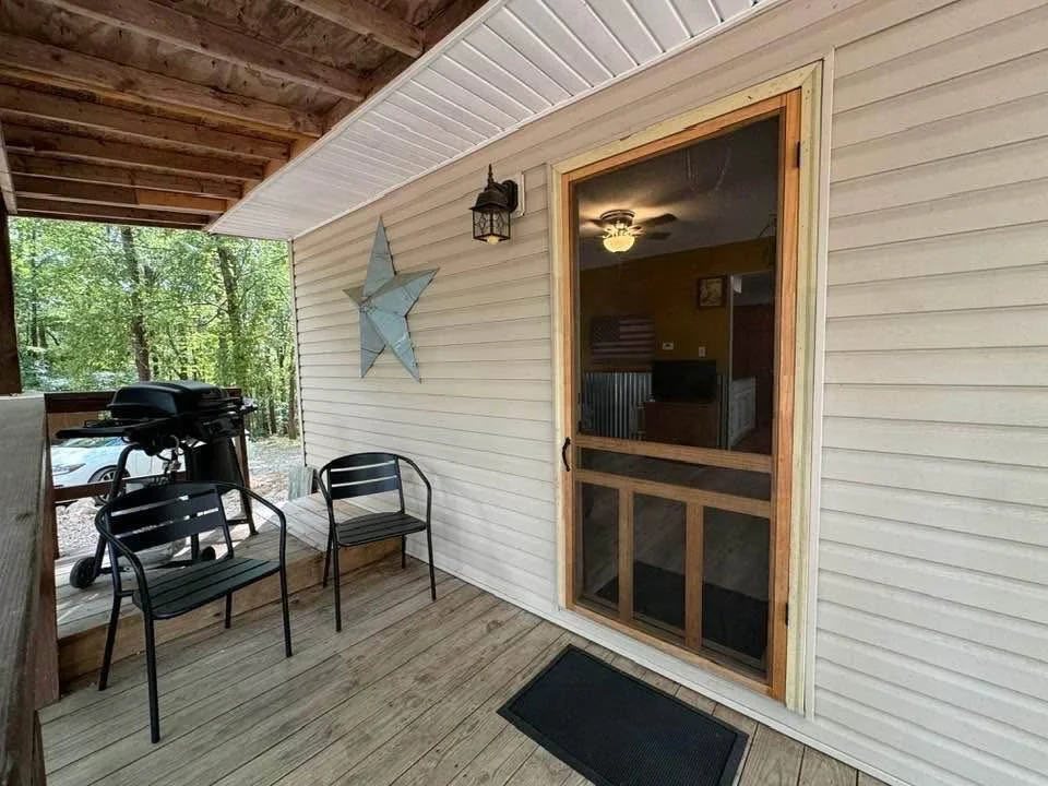 Cabin porch at Palmerosa Campground near Old Man